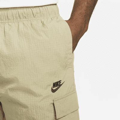 Nike Sportswear Repeat Men's Woven Trousers. Nike GB